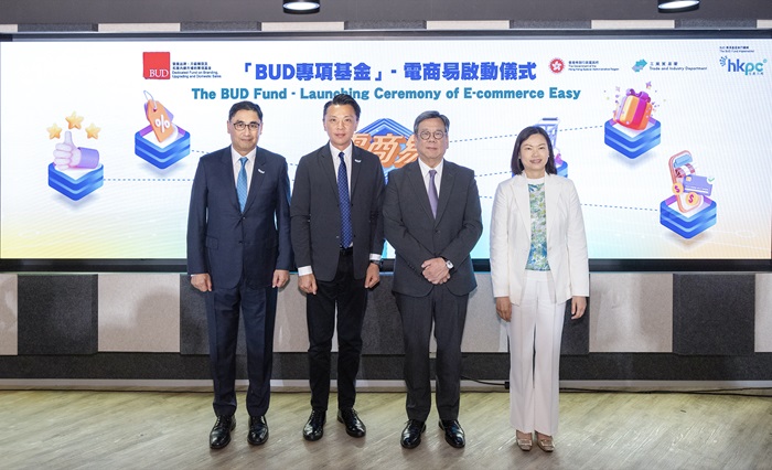 Mr Algernon YAU, Secretary for Commerce and Economic Development (second right), together with Ms Maggie WONG, Director-General of Trade and Industry (first right); Hon Sunny TAN, Chairman of HKPC, (second left); and Mr Mohamed BUTT, Executive Director of HKPC (first left), officiate at the launching ceremony of “E-commerce Easy”.